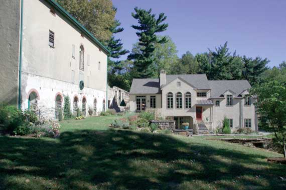 New Rose Valley residence built within the foundation walls of an old barn